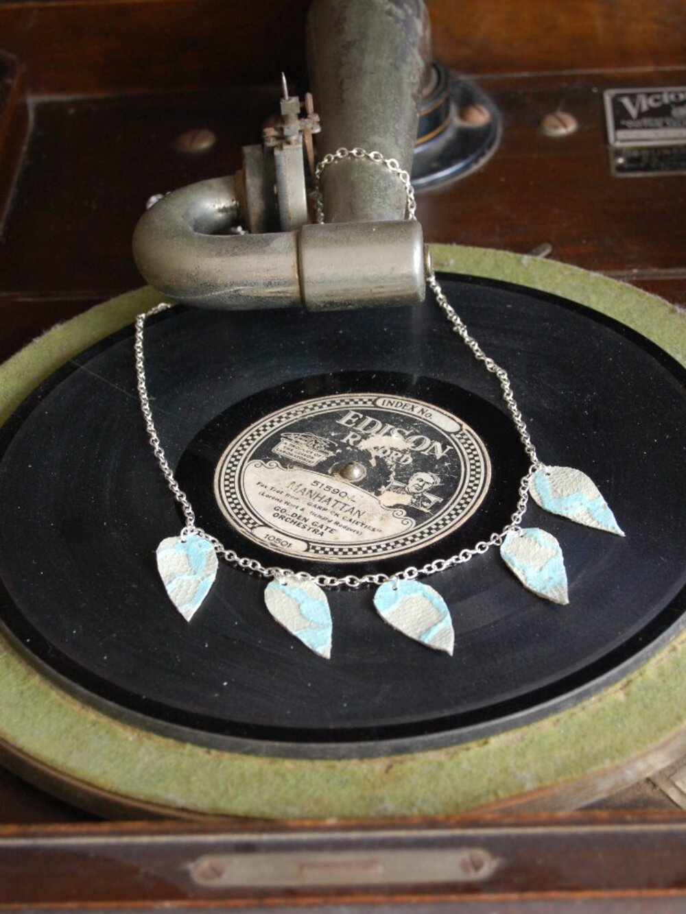 Urban teal lace on leather long necklace - Feather shaped turquoise floral